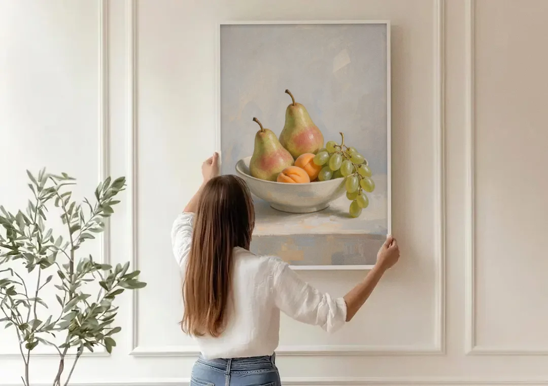 Fruit Bowl Still Life Painting With Pears and Grapes canvas wall art being hung on a paneled wall