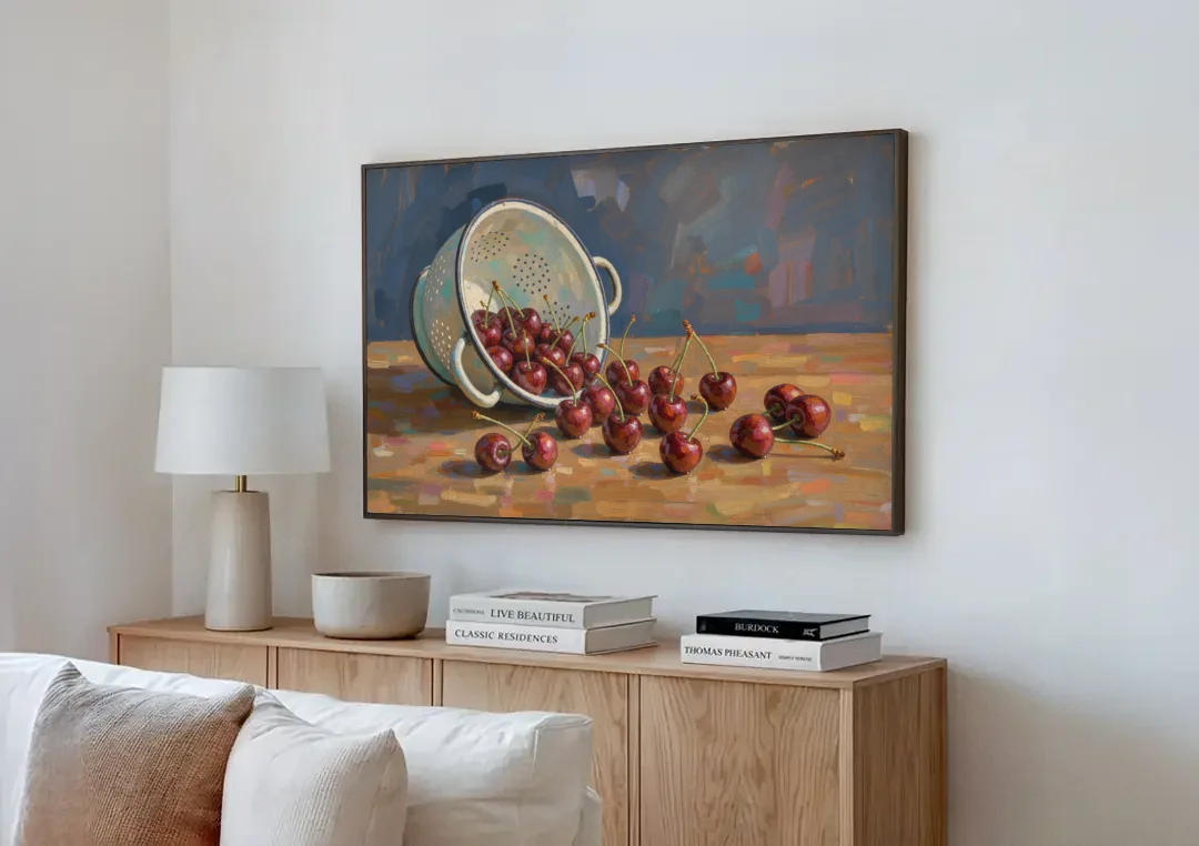Fruit Still Life Painting with Spilled Cherries canvas wall art above a wooden sideboard next to a sofa
