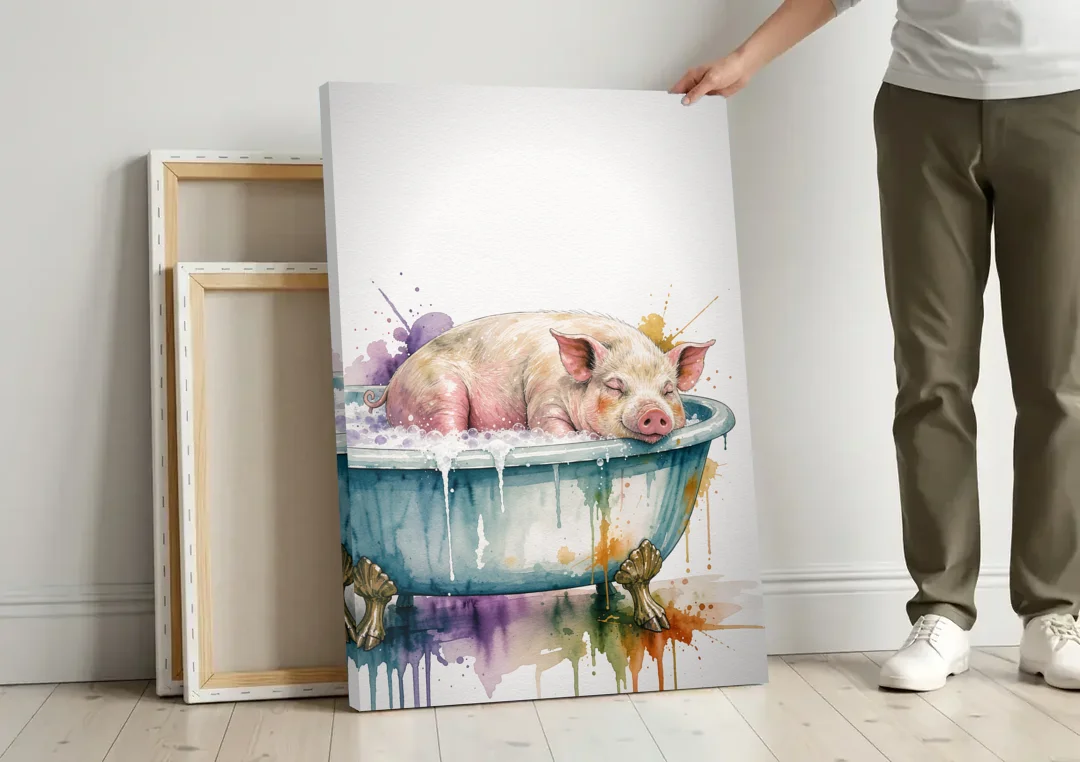 Funny Bathroom Decor Pig Asleep in the Tub canvas wall art leaning against a wall next to blank canvases