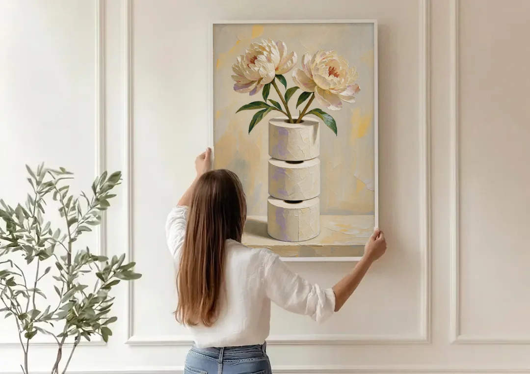 Funny Bathroom Painting of Peonies on Paper Rolls canvas wall art being hung on a paneled wall