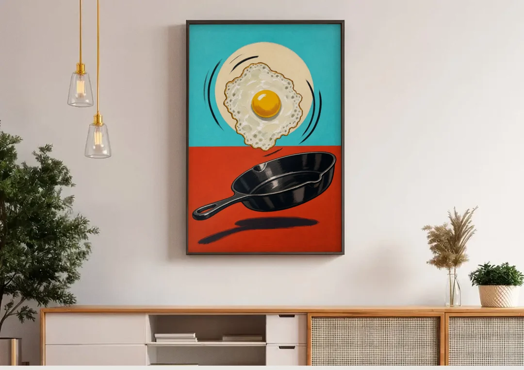 Funny Kitchen Wall Art with a Flipping Fried Egg canvas wall art above a wooden sideboard under pendant lights