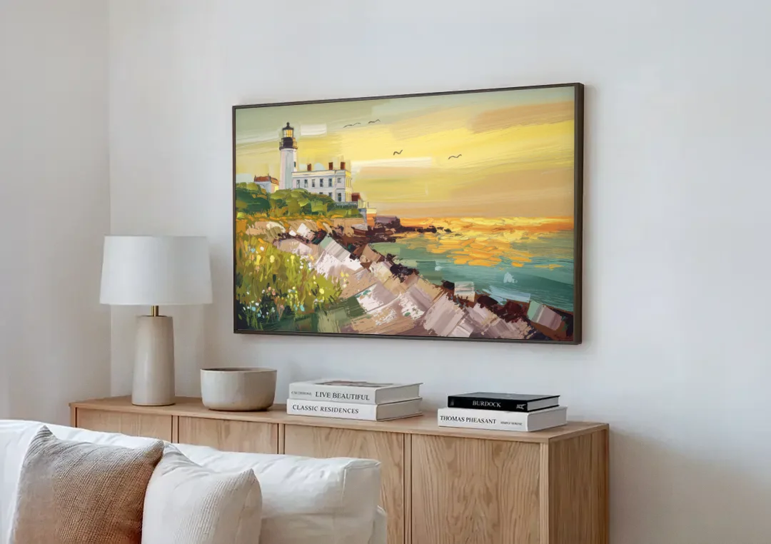 Galveston Lighthouse View canvas wall art above a wooden sideboard next to a sofa