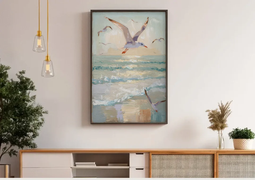 Galveston Seagulls in Flight canvas wall art above a wooden sideboard under pendant lights