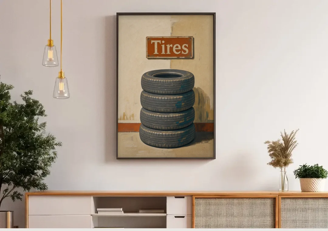 Garage Man Cave Decor with Stacked Old Tires canvas wall art above a wooden sideboard under pendant lights