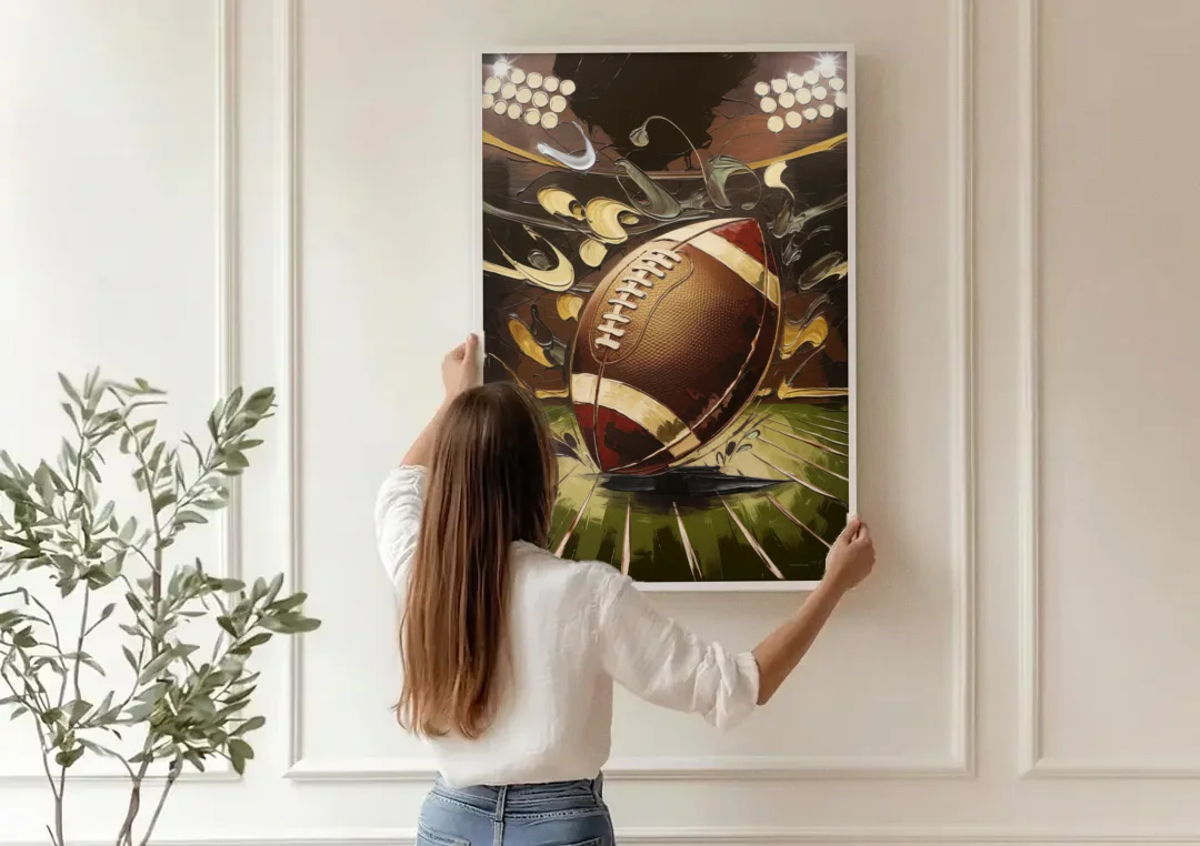 Garland Football Spirit canvas wall art being hung on a paneled wall