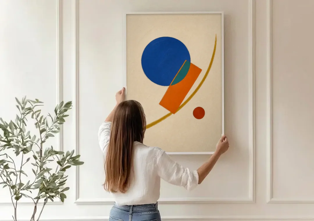 Geometric Abstract Art with Cobalt Sun and Tail Fin canvas wall art being hung on a paneled wall