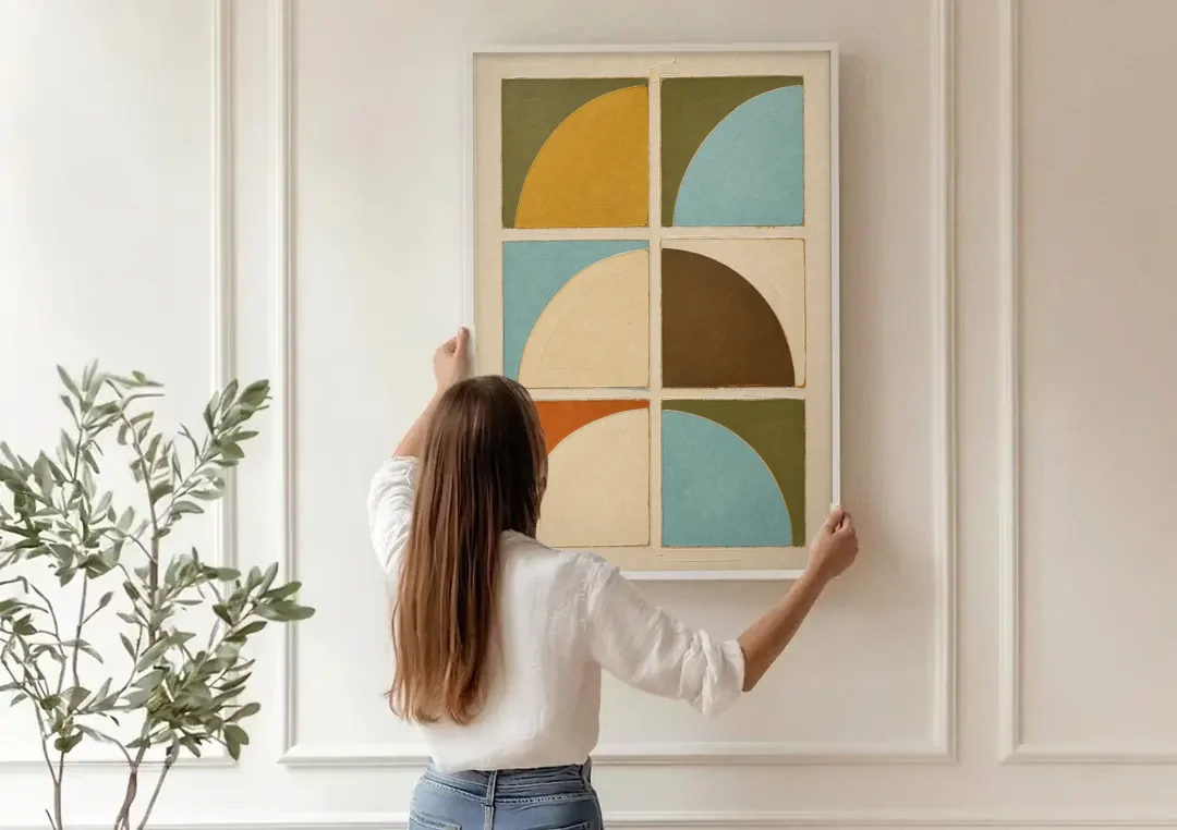 Geometric Art Prints of Six Turning Quarter Circles canvas wall art being hung on a paneled wall