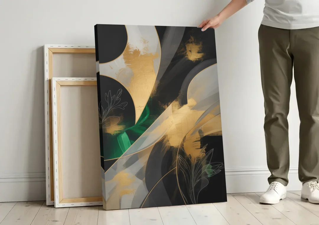 Geometric Elegance Black and Gold Abstract canvas wall art leaning against a wall next to blank canvases