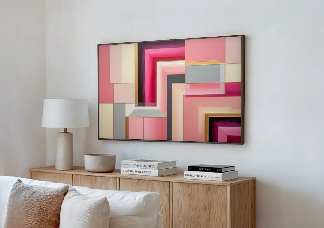 Geometric Elegance in Pink Abstract canvas wall art above a wooden sideboard next to a sofa