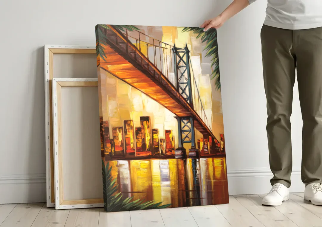 George Washington Bridge Scenic canvas wall art leaning against a wall next to blank canvases