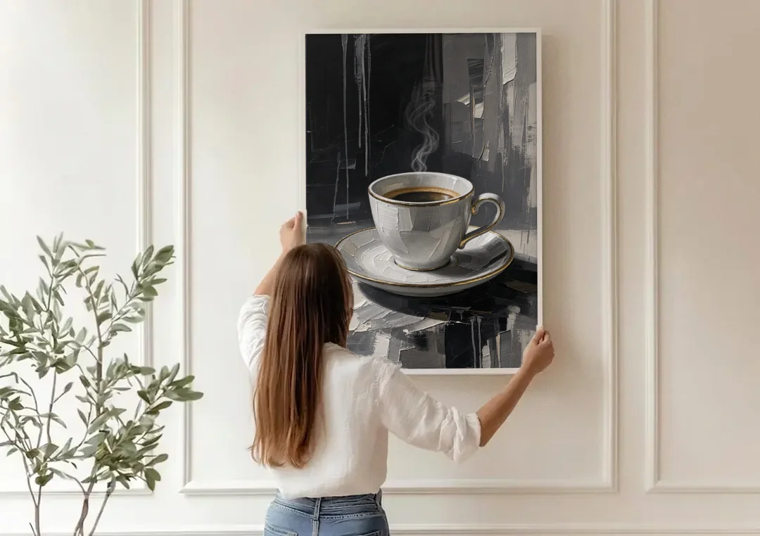 Black and White Gilded Espresso Cup for the Kitchen canvas wall art being hung on a paneled wall