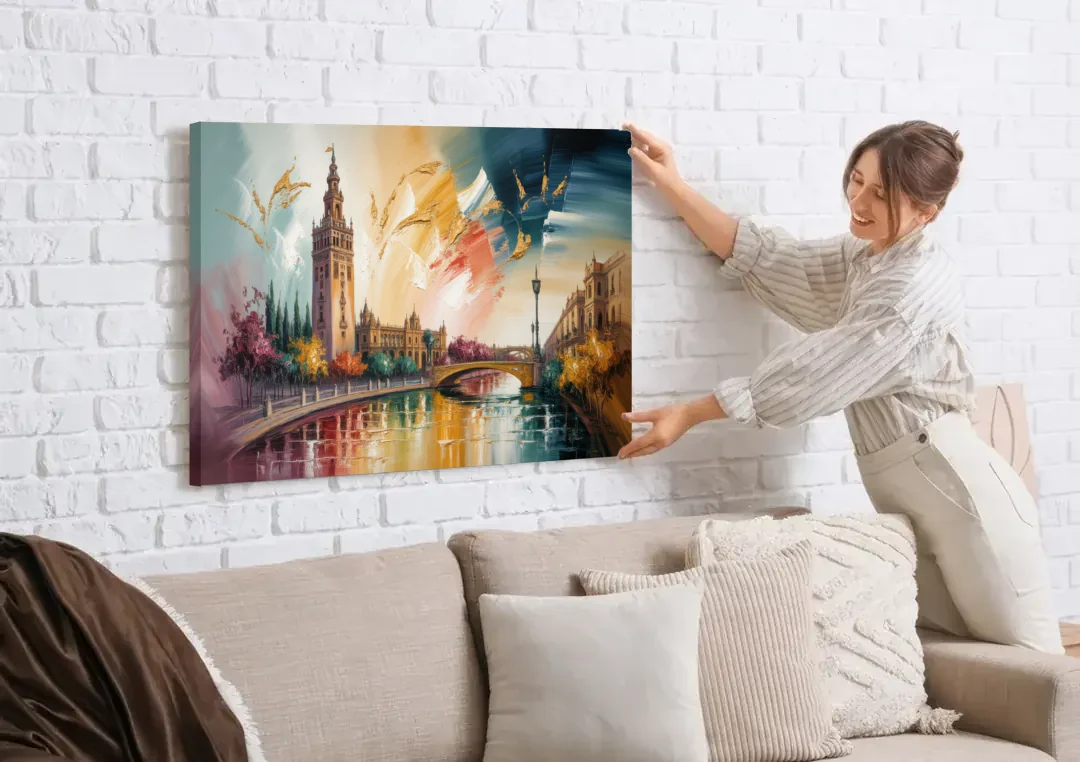 Giralda Grace canvas wall art being hung on a white brick wall above a sofa