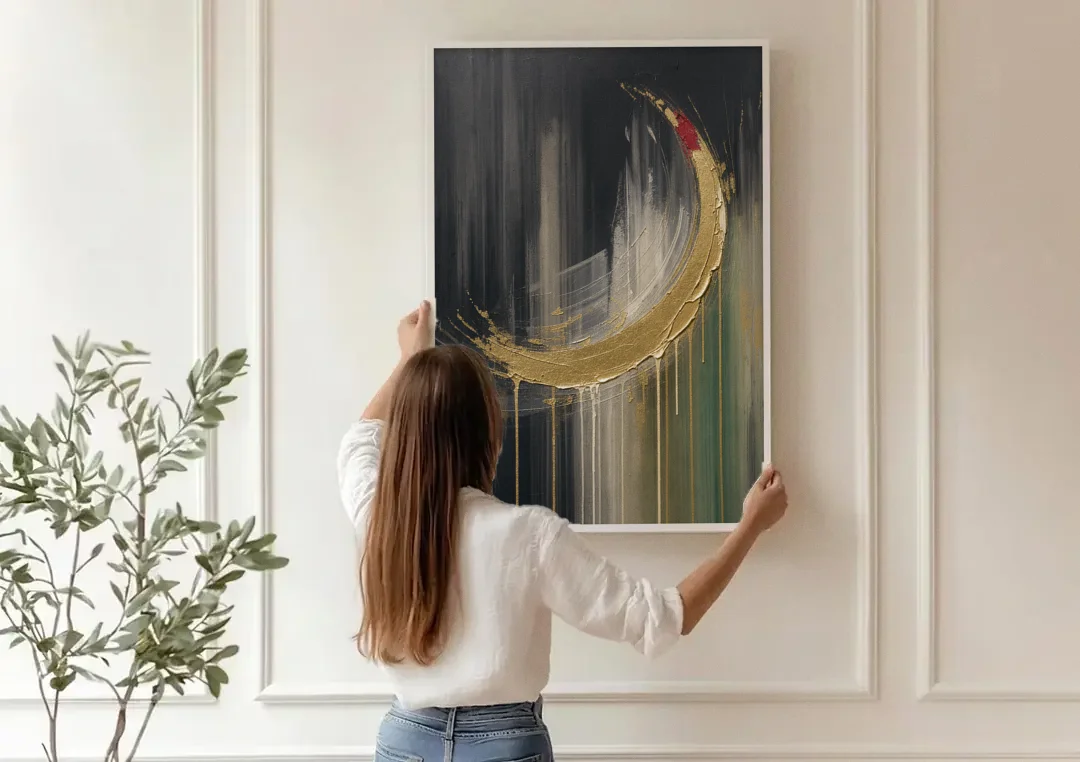 Gold Abstract Crimson-Tipped Crescent canvas wall art being hung on a paneled wall