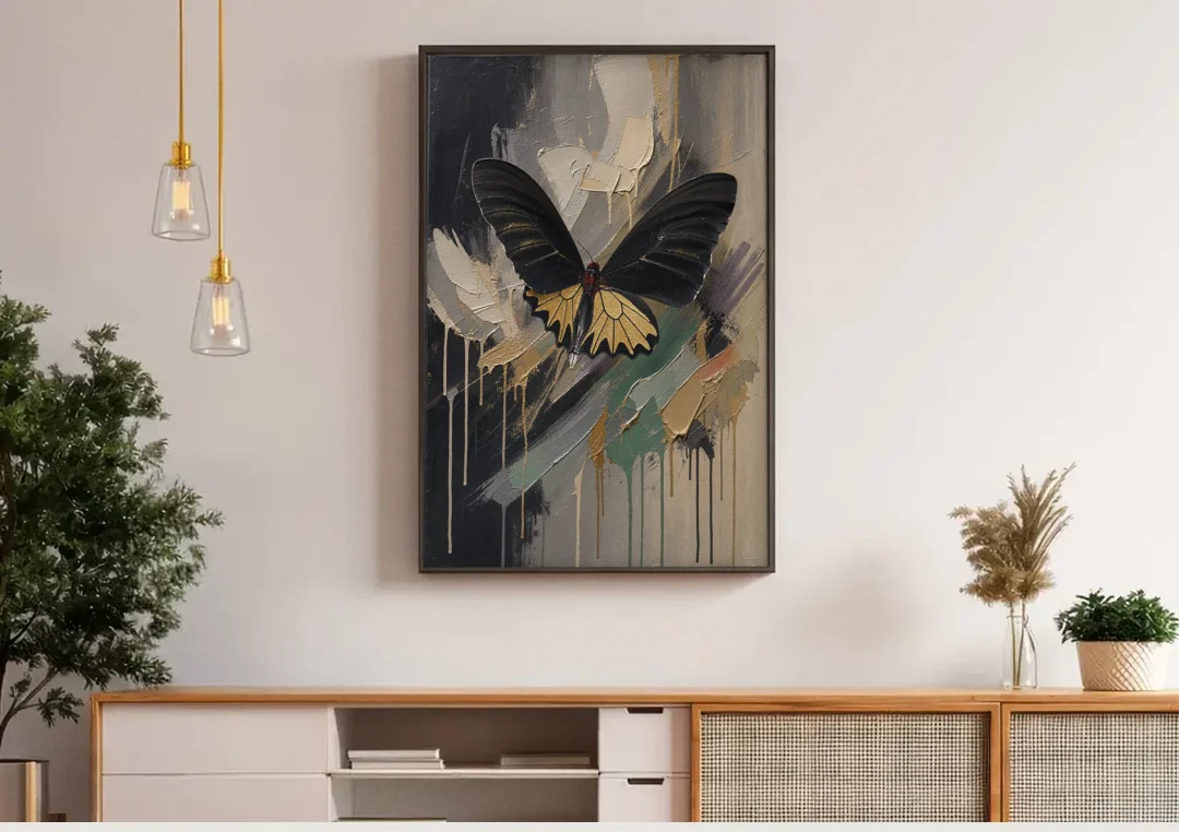 Gold Butterfly Wall Art of a Birdwing on Charcoal canvas wall art above a wooden sideboard under pendant lights