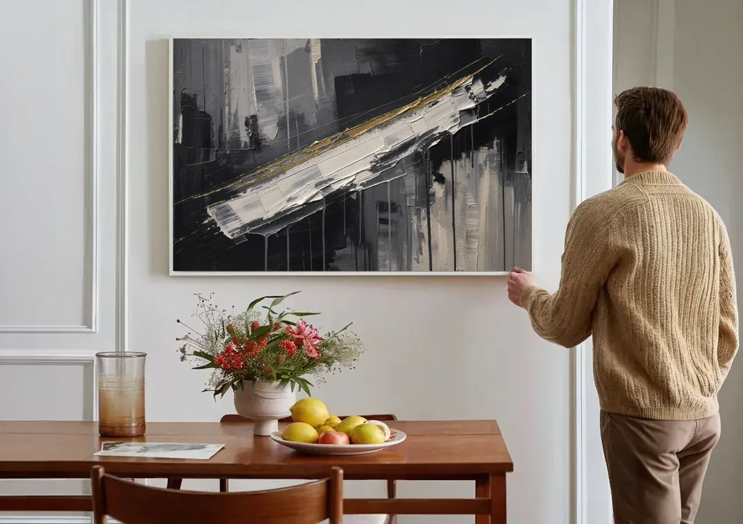 Gold-Edged White Sweep in Black and White canvas wall art above a dining table