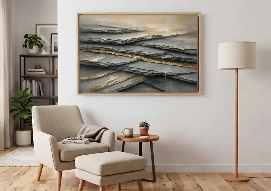 Gold Leaf Abstract Painting of Slate Seams canvas wall art above an armchair in a bright living room