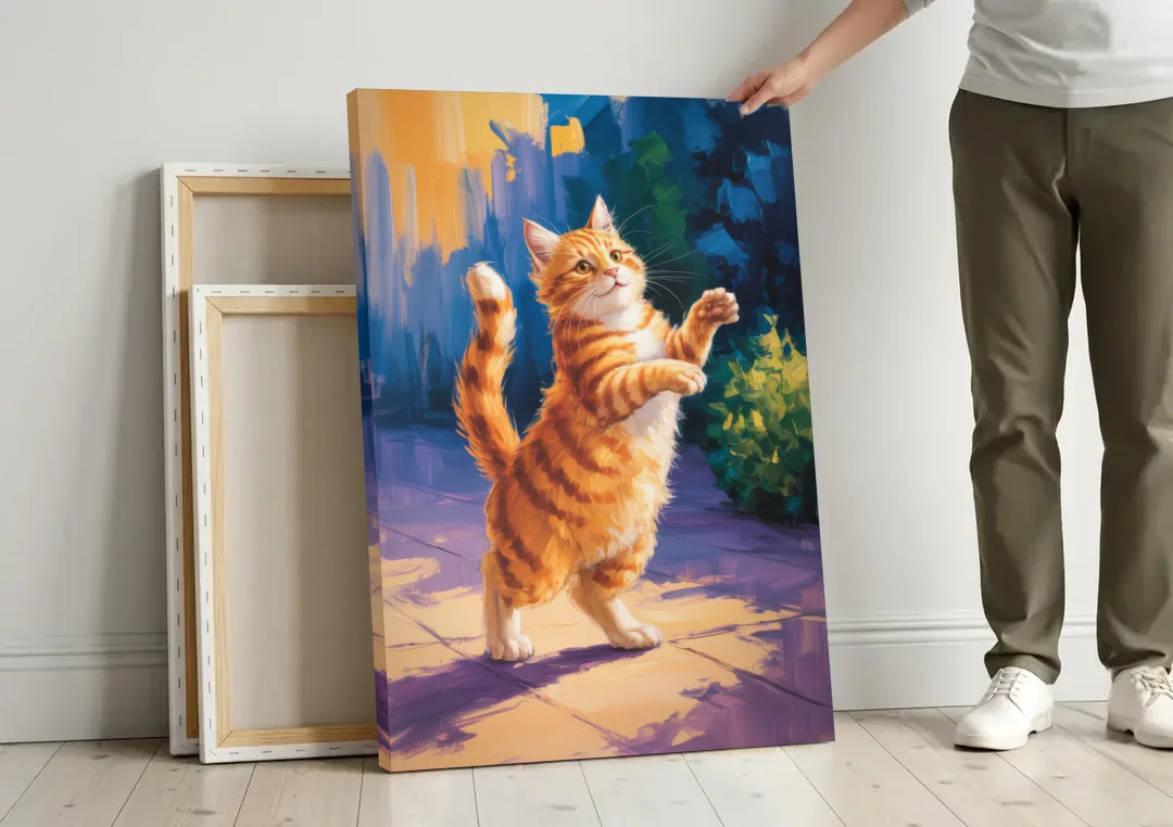 Golden Hour Orange Cat canvas wall art leaning against a wall next to blank canvases