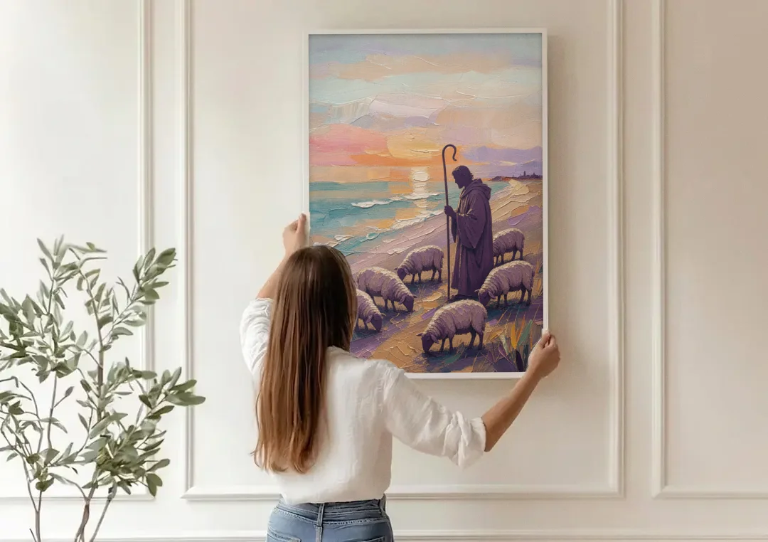 Good Shepherd Painting at Sunset by the Sea canvas wall art being hung on a paneled wall
