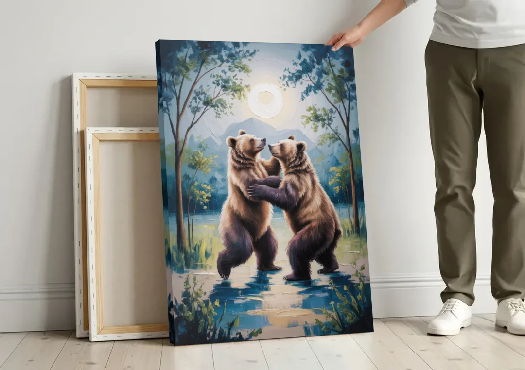 Graceful Bear Dance in Moonlight canvas wall art leaning against a wall next to blank canvases