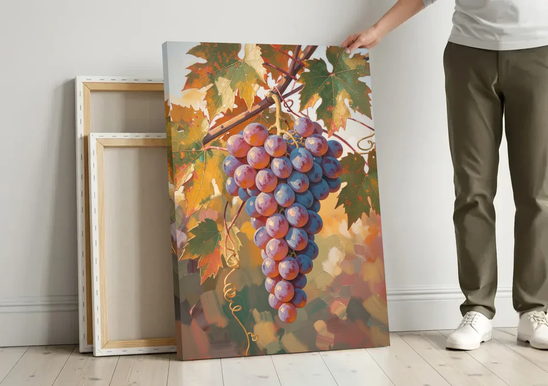 Grapes in Late Vine Light for the Dining Room canvas wall art leaning against a wall next to blank canvases