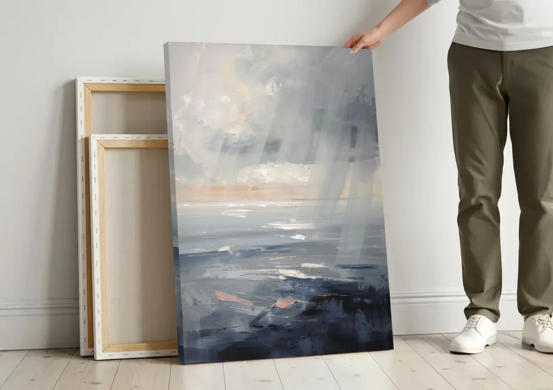 Gray Rain Curtain at Sea for the Bathroom canvas wall art leaning against a wall next to blank canvases