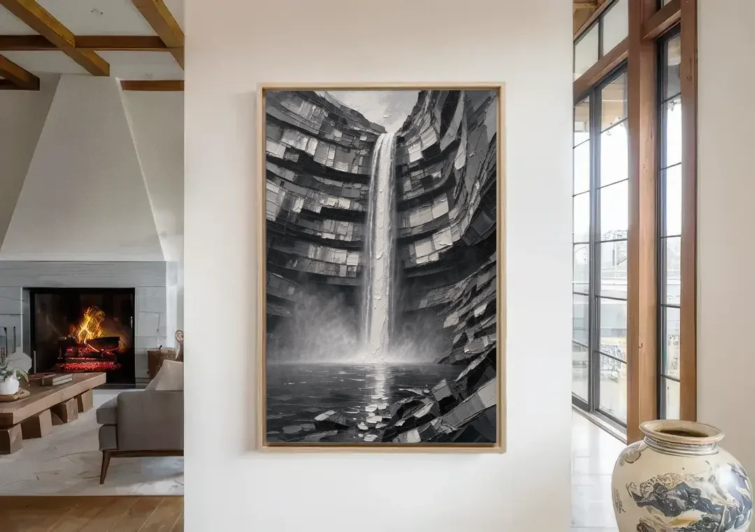 Grayscale Wall Art of a Canyon Waterfall canvas wall art in a living room with a fireplace