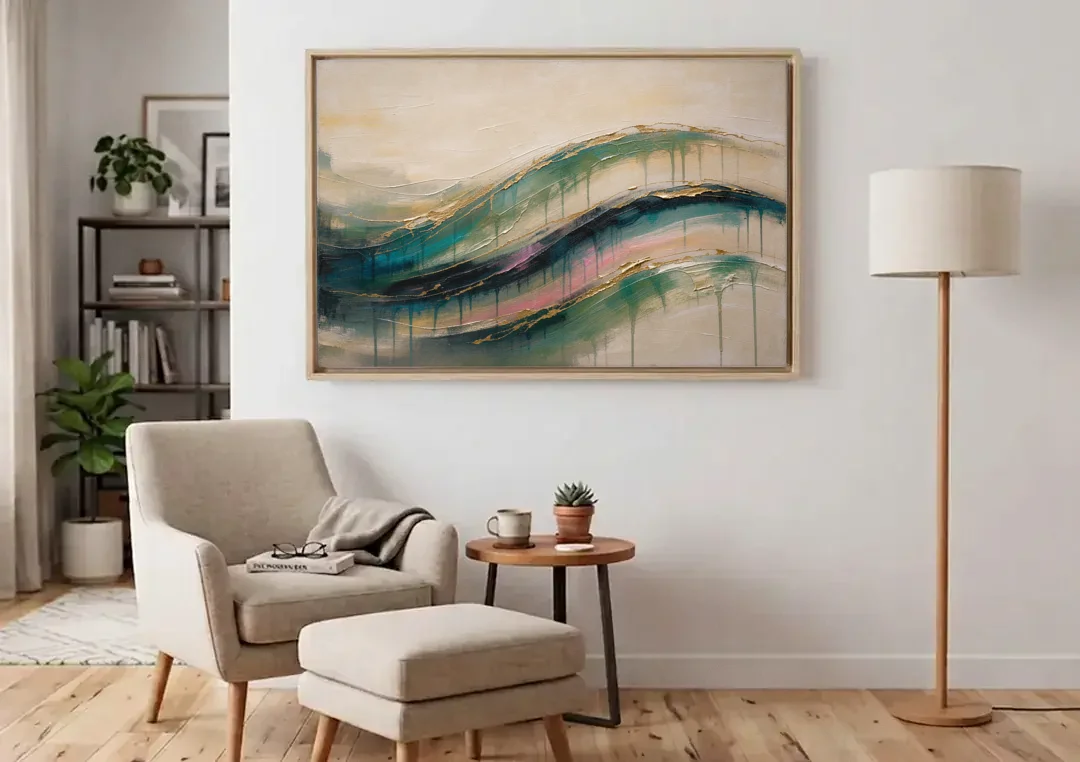 Green Abstract Emerald Tide with Gold Veins canvas wall art above an armchair in a bright living room