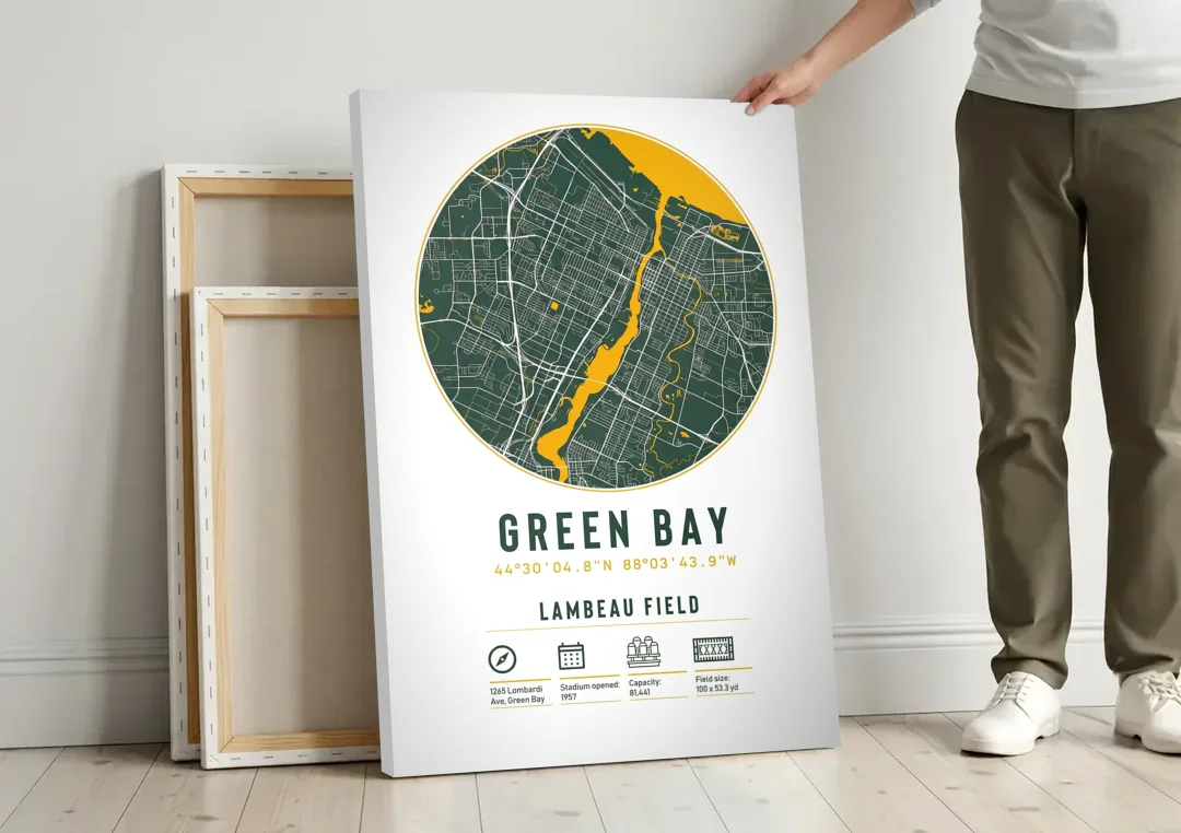 Green Bay Packers Lambeau Field Stadium Map canvas wall art leaning against a wall next to blank canvases