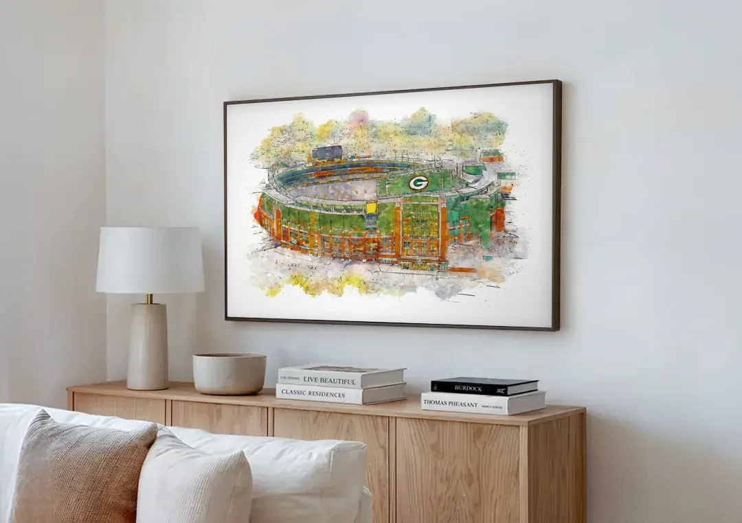 Green Bay Packers Lambeau Field Watercolor Stadium canvas wall art above a wooden sideboard next to a sofa