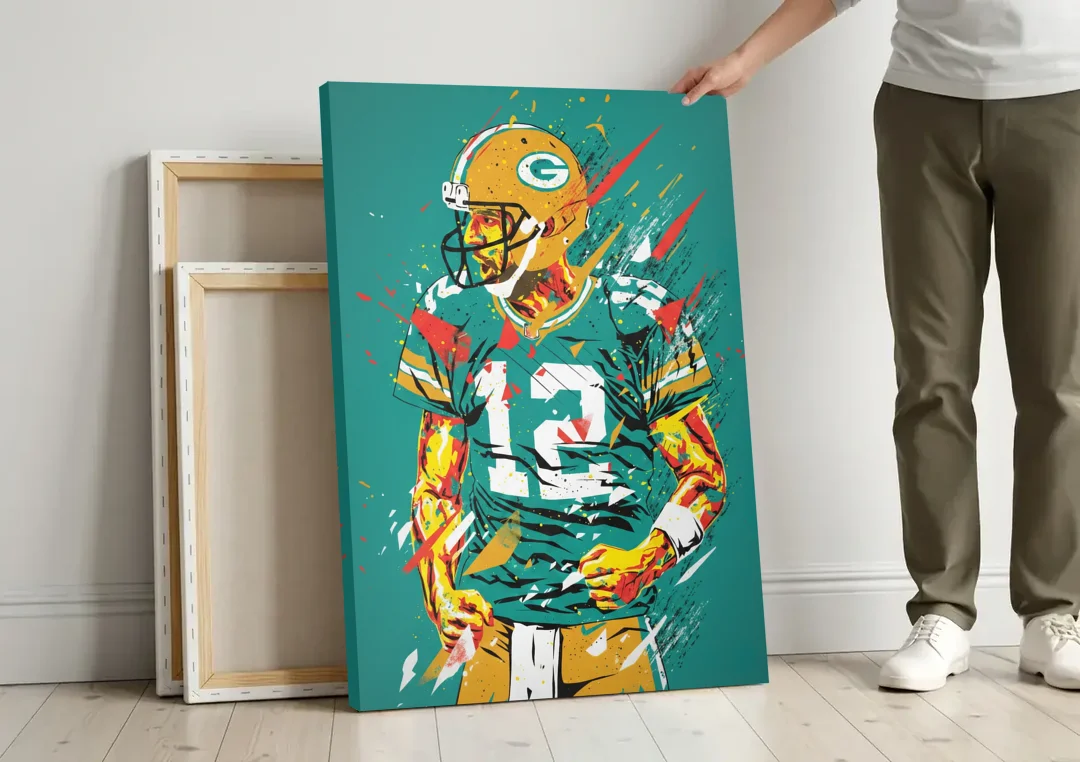 Green Bay Packers Pop Art - Aaron Rodgers canvas wall art leaning against a wall next to blank canvases