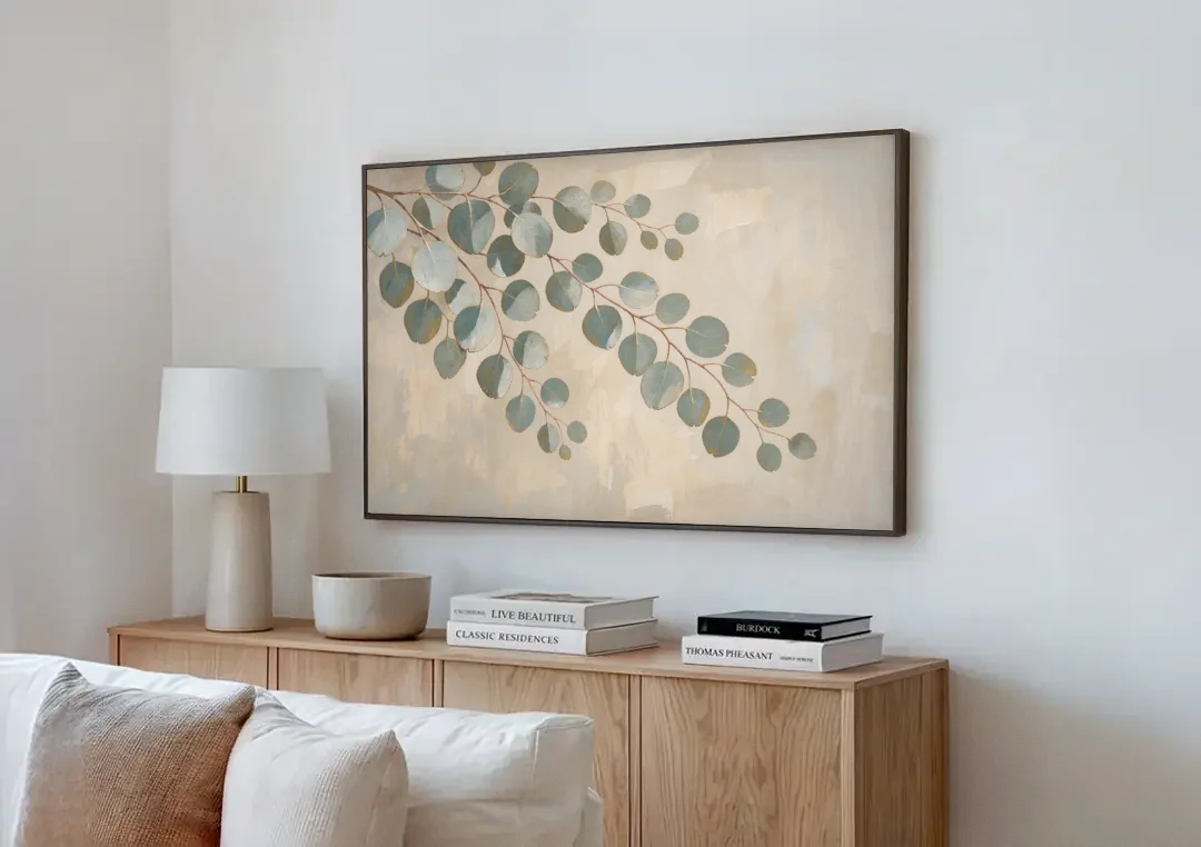Greenery Wall Art of Trailing Silver Dollar Eucalyptus canvas wall art above a wooden sideboard next to a sofa