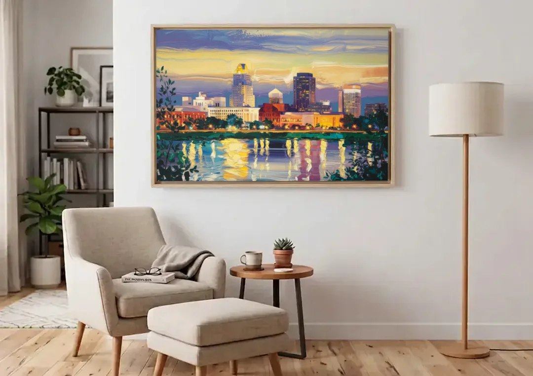 Greensboro Cityscape Panorama canvas wall art above an armchair in a bright living room