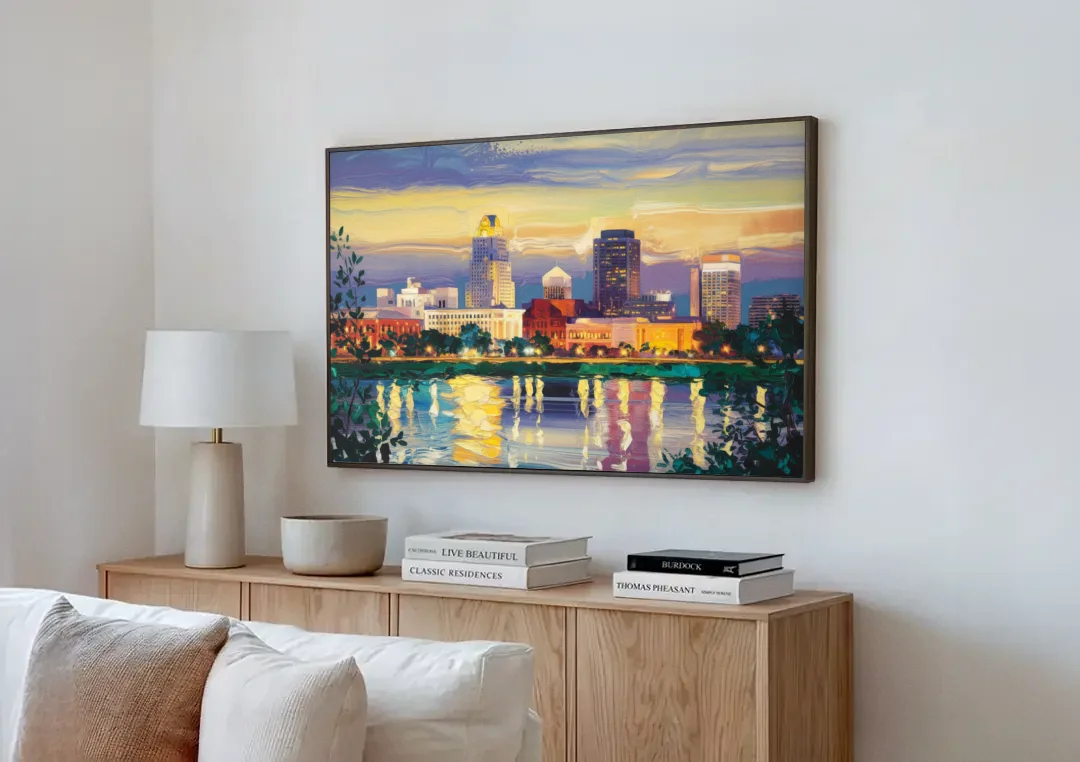 Greensboro Cityscape Panorama canvas wall art above a wooden sideboard next to a sofa
