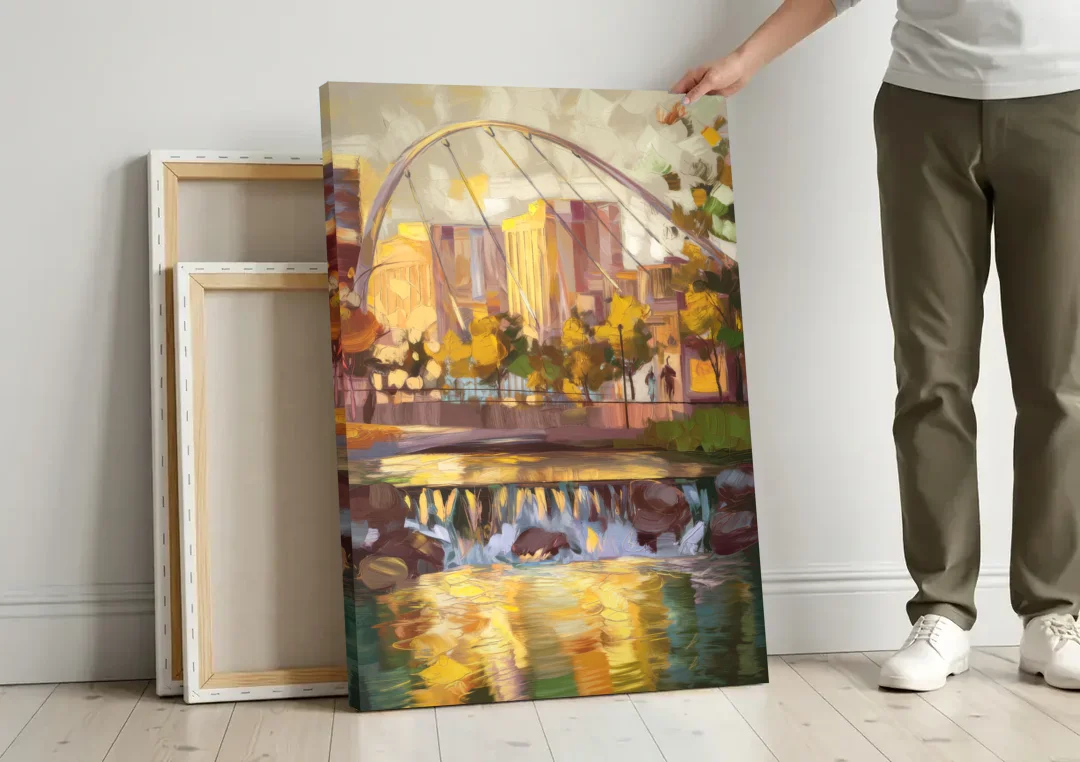 Greenville Downtown Streetscape canvas wall art leaning against a wall next to blank canvases