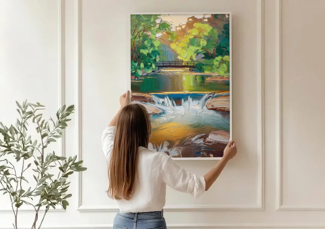 Greenville Reedy River Views canvas wall art being hung on a paneled wall