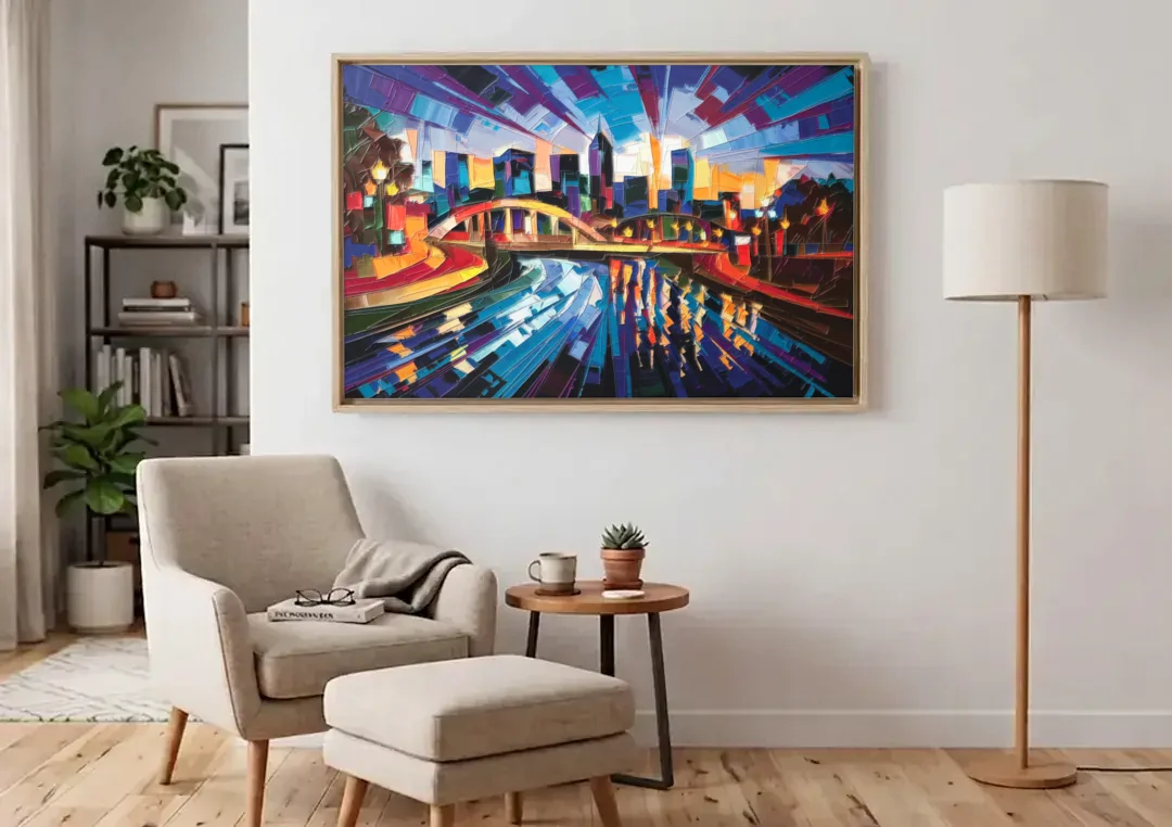 Greenville Vibrant Cityscape canvas wall art above an armchair in a bright living room