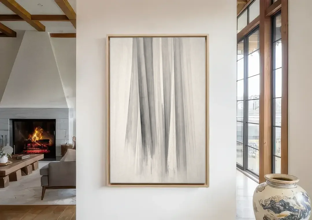 Grey and White Abstract Painting of Hanging Veils canvas wall art in a living room with a fireplace