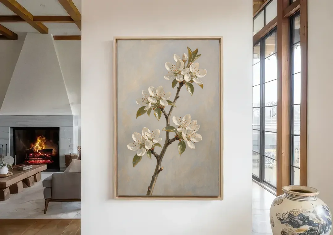 Grey Floral Wall Art with Pear Blossom Stem canvas wall art in a living room with a fireplace