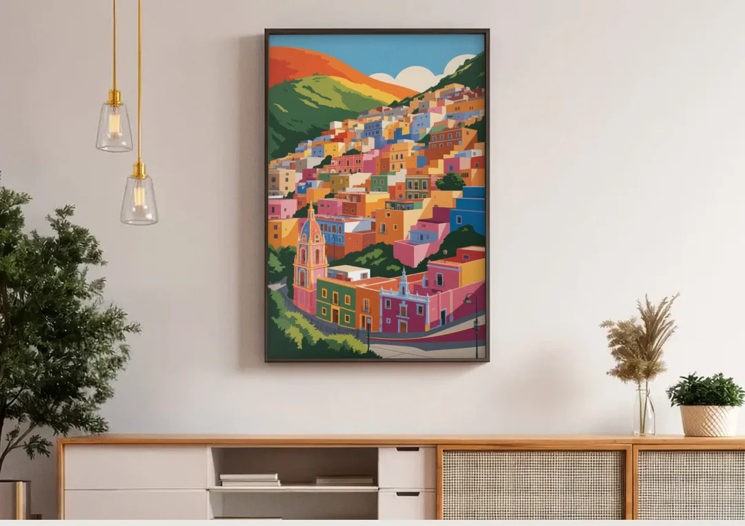 Guanajuato Colorful Hills canvas wall art above a wooden sideboard under pendant lights