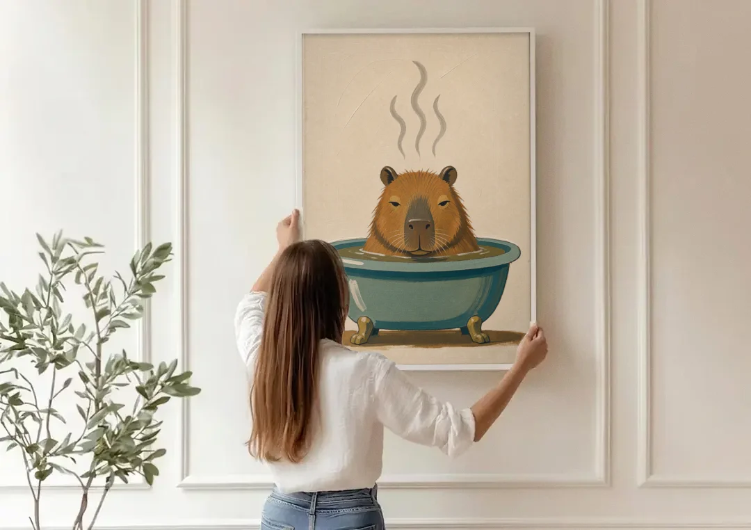 Guest Bathroom Wall Art with a Steaming Capybara canvas wall art being hung on a paneled wall