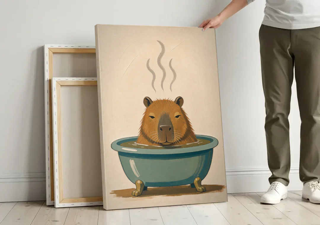 Guest Bathroom Wall Art with a Steaming Capybara canvas wall art leaning against a wall next to blank canvases