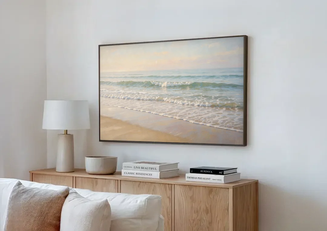 Guest Bedroom Decor of Hazy Morning Surf canvas wall art above a wooden sideboard next to a sofa