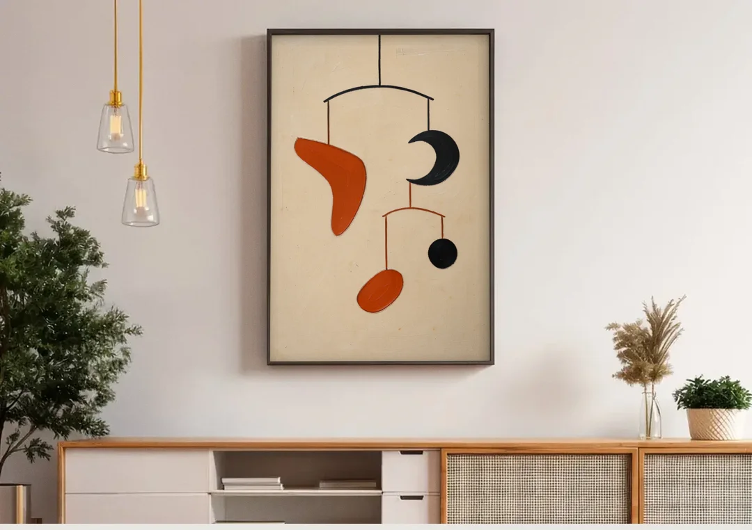 Hanging Mobile of Vermilion and Black Shapes canvas wall art above a wooden sideboard under pendant lights