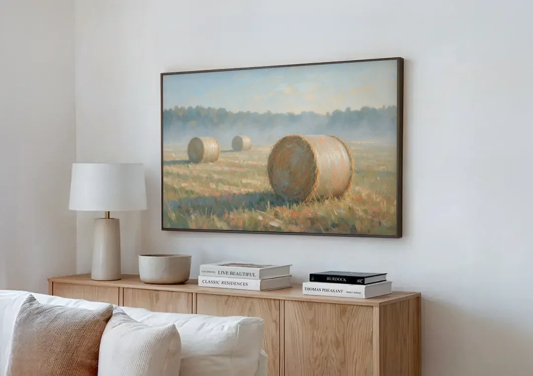 Hay Bales Painting at First Peach Light canvas wall art above a wooden sideboard next to a sofa