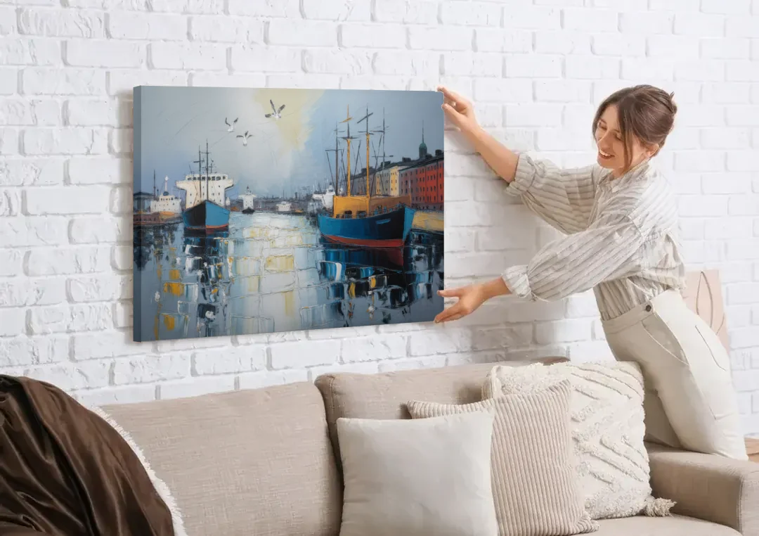 Helsinki Harbor canvas wall art being hung on a white brick wall above a sofa
