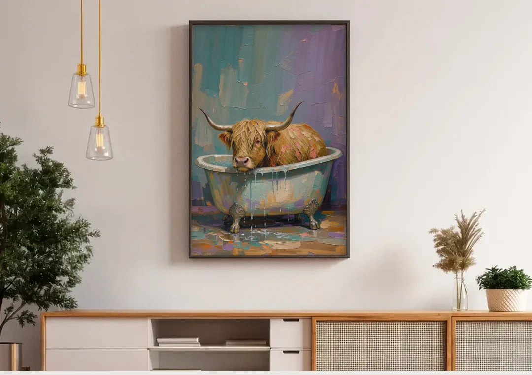 Highland Cow Bathroom Wall Art in a Too-Small Tub canvas wall art above a wooden sideboard under pendant lights