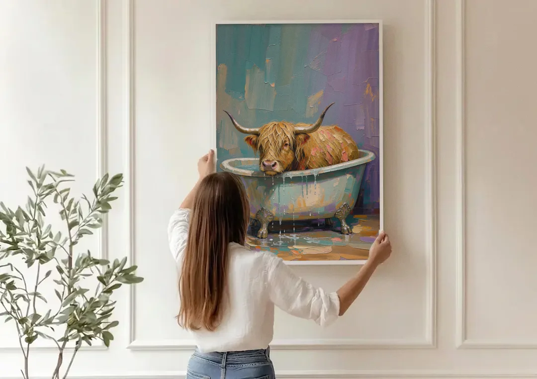 Highland Cow Bathroom Wall Art in a Too-Small Tub canvas wall art being hung on a paneled wall