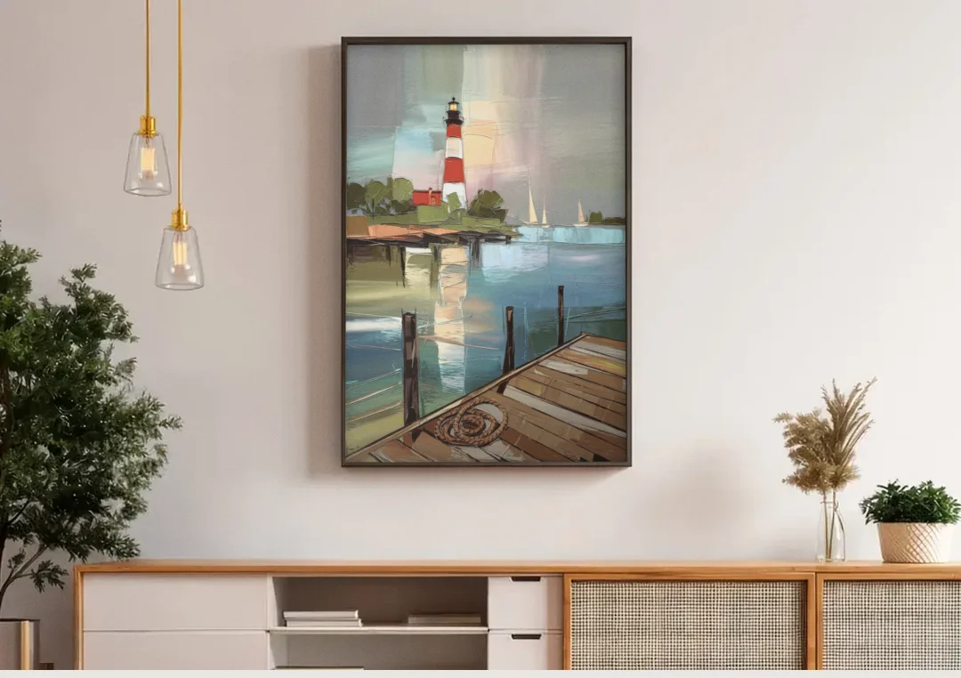 Hilton Head Island Coastal Lighthouse canvas wall art above a wooden sideboard under pendant lights