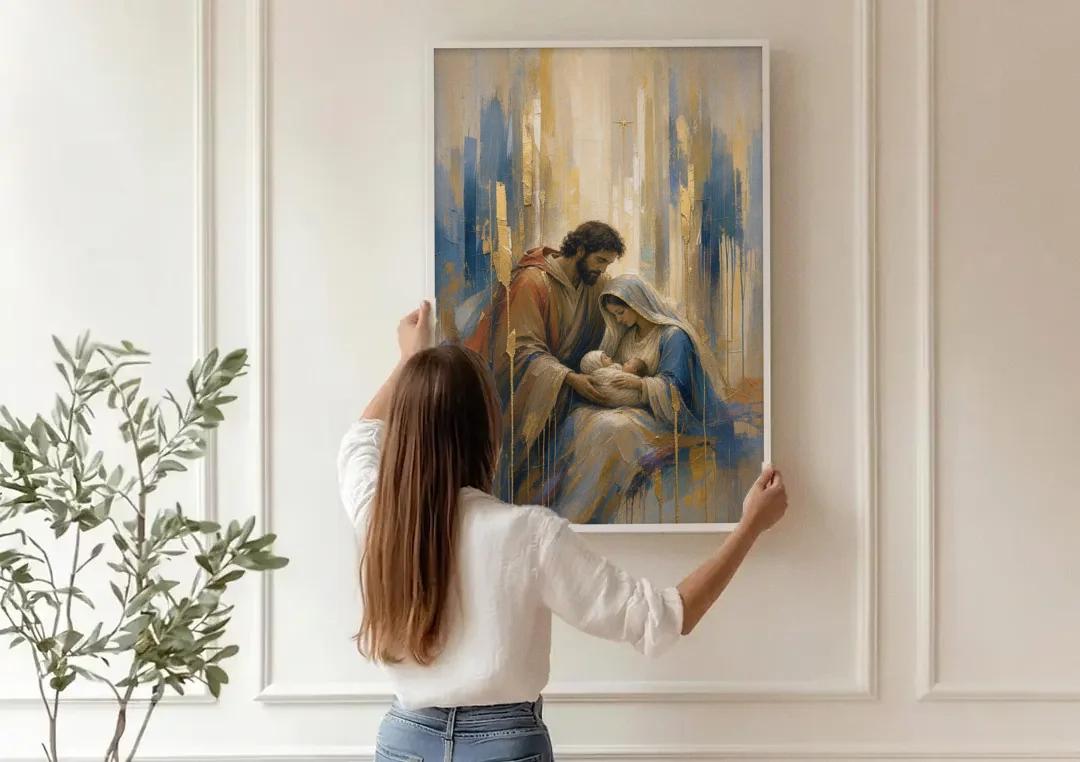 Holy Family Canvas in Indigo and Gold canvas wall art being hung on a paneled wall