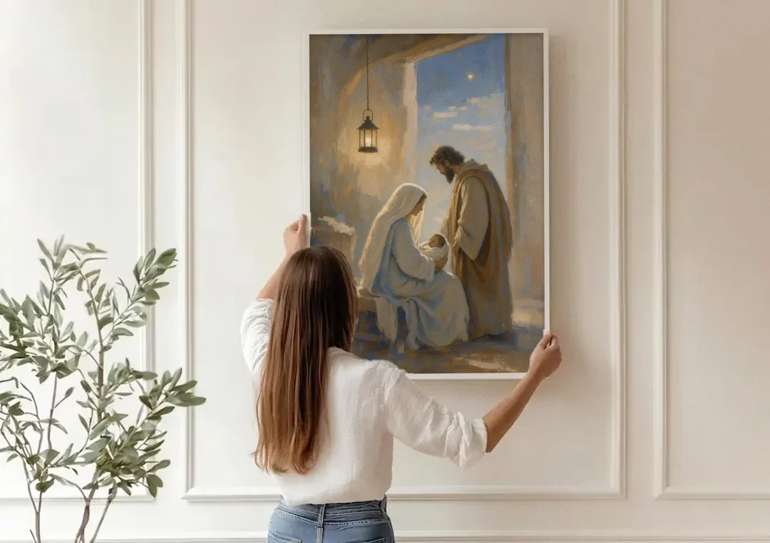 Holy Family Painting by Lantern Light canvas wall art being hung on a paneled wall
